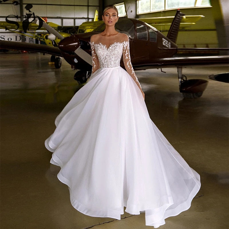 Most Beautiful and Elegant African Wedding Dresses 2021 Lace Applique Beading O-neck Organza Long Sleeve Wedding Gown Beach Bridal Dress